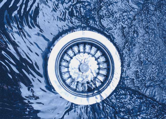 Drain with water flowing freely through